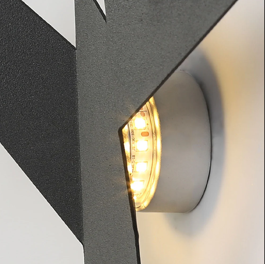 Creative wall lamp made of iron in a spherical shape