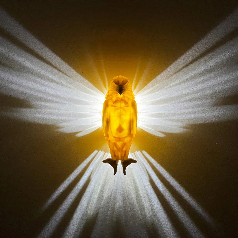 Winged wall lamps