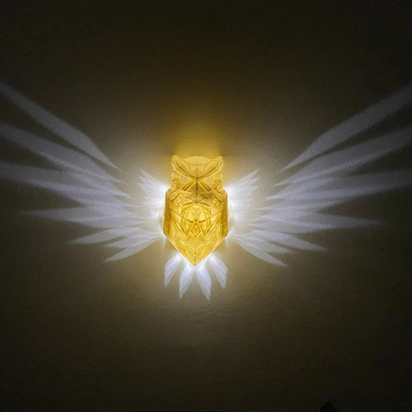 Winged wall lamps
